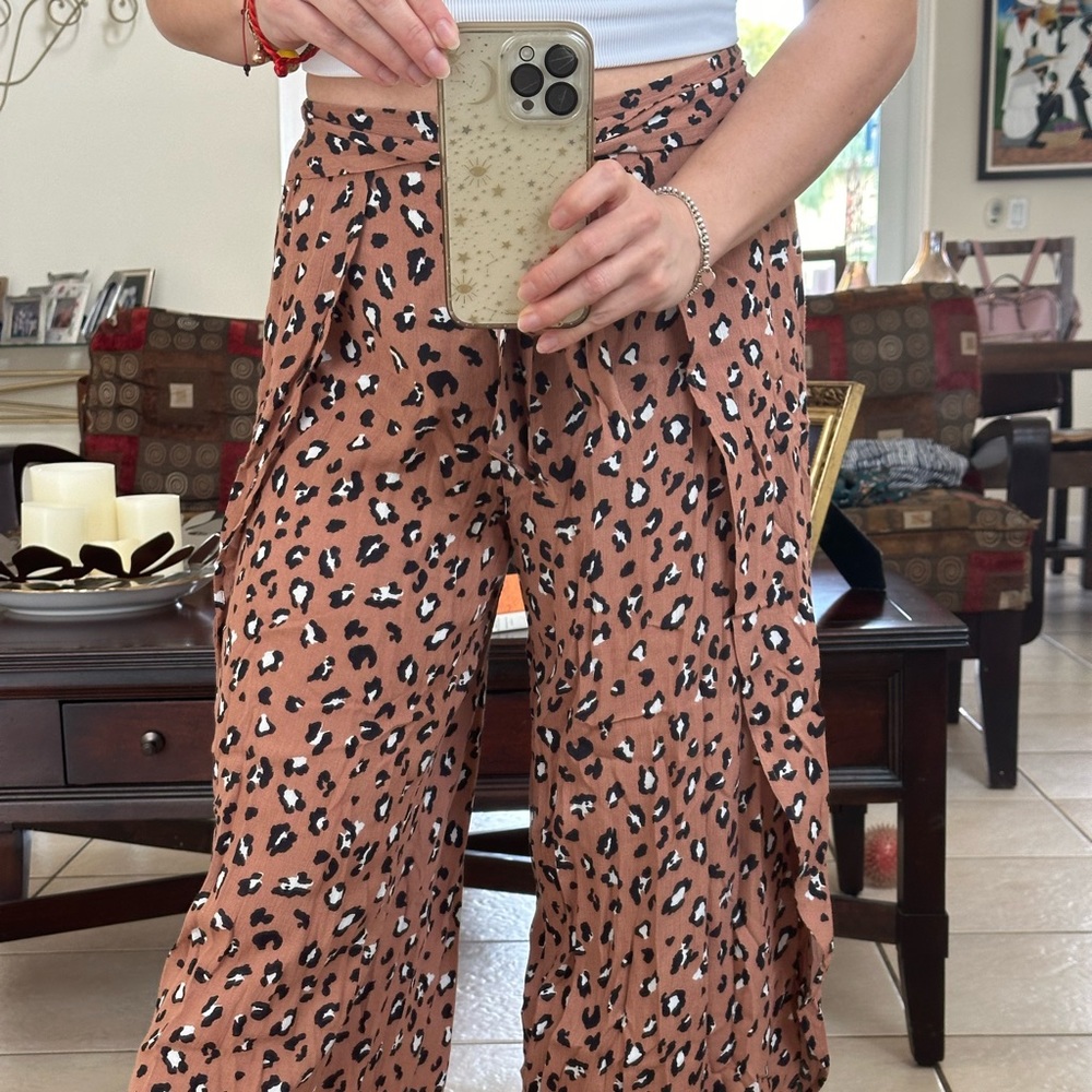 - elevated pants; flowy fit; animal print